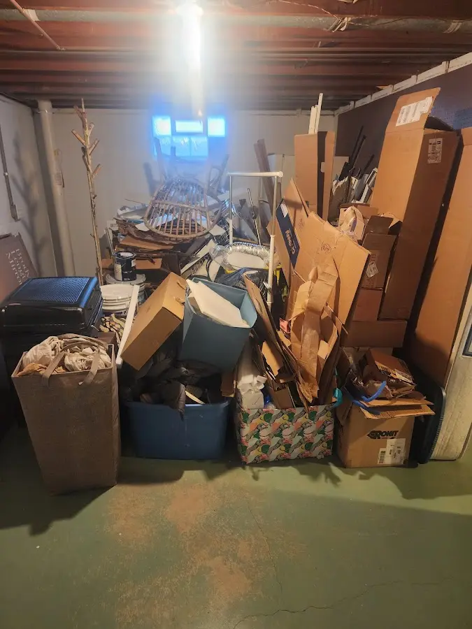 Roll-off dumpster container at job site for Concrete Dumpster Rental in College